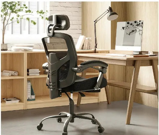 Retractable Footrest Ergonomic Swivel Office Chair The Chair Company
